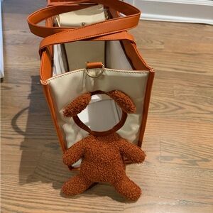 Orange and Cream Pet Carrier with Plush Toy